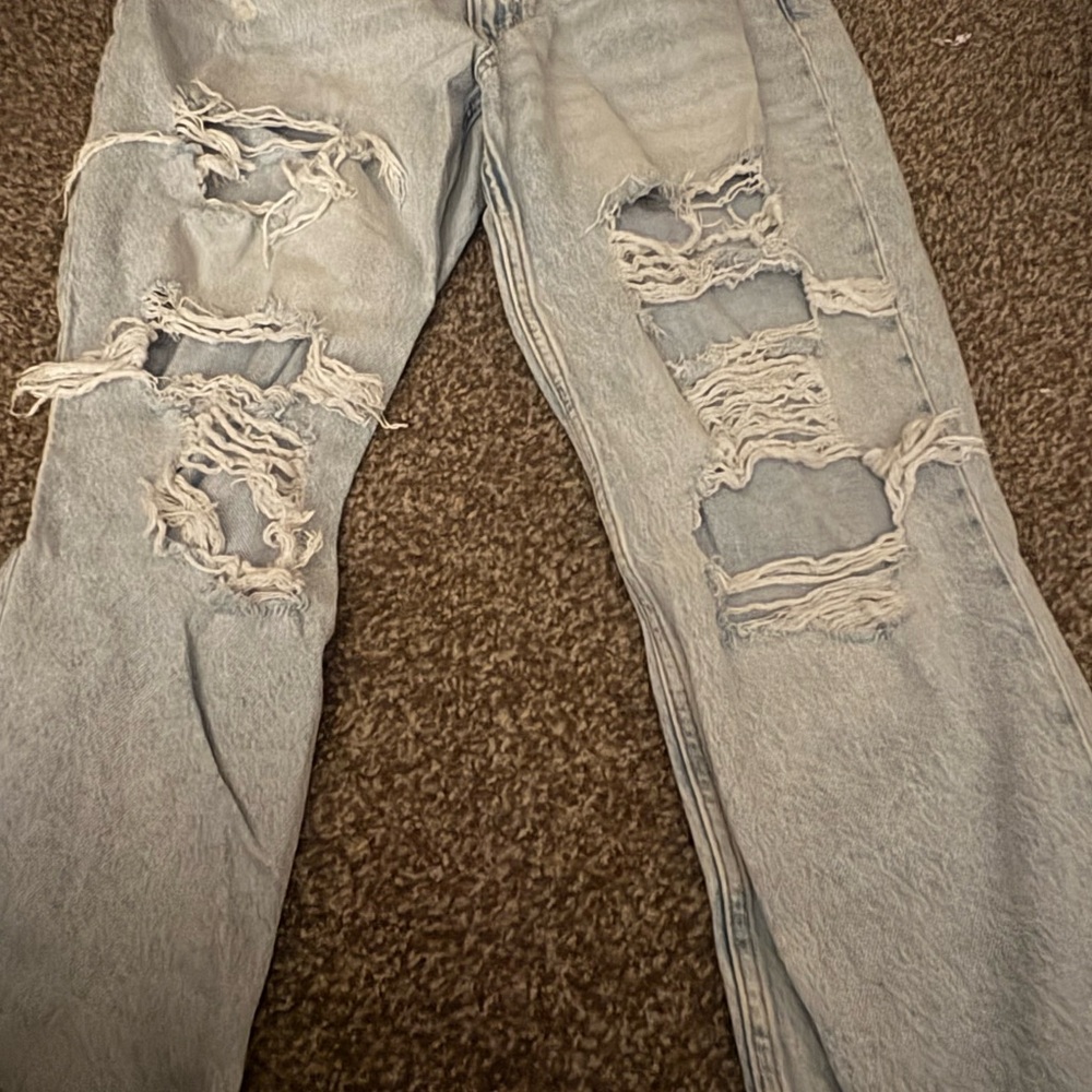 Woman’s Light Blue Distressed Jeans